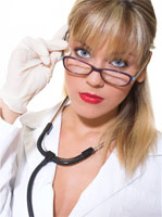 Doctor peering over her glasses